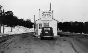 The main security gate to Project Y at Los Alamos, New Mexico, 1943. The checkpoint where the outside world ended and The Hill began.